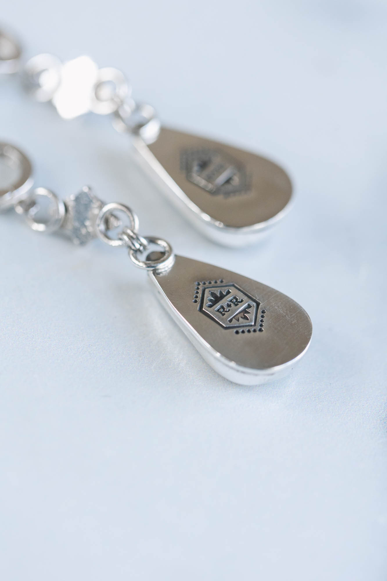 Royston Ribbon Diamond Huggie Hoops - Image 3